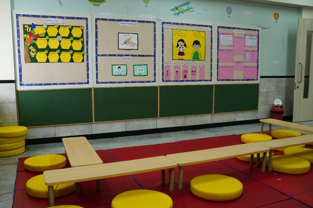Primary classroom interior and storage cubbies at VIBGYOR Pune