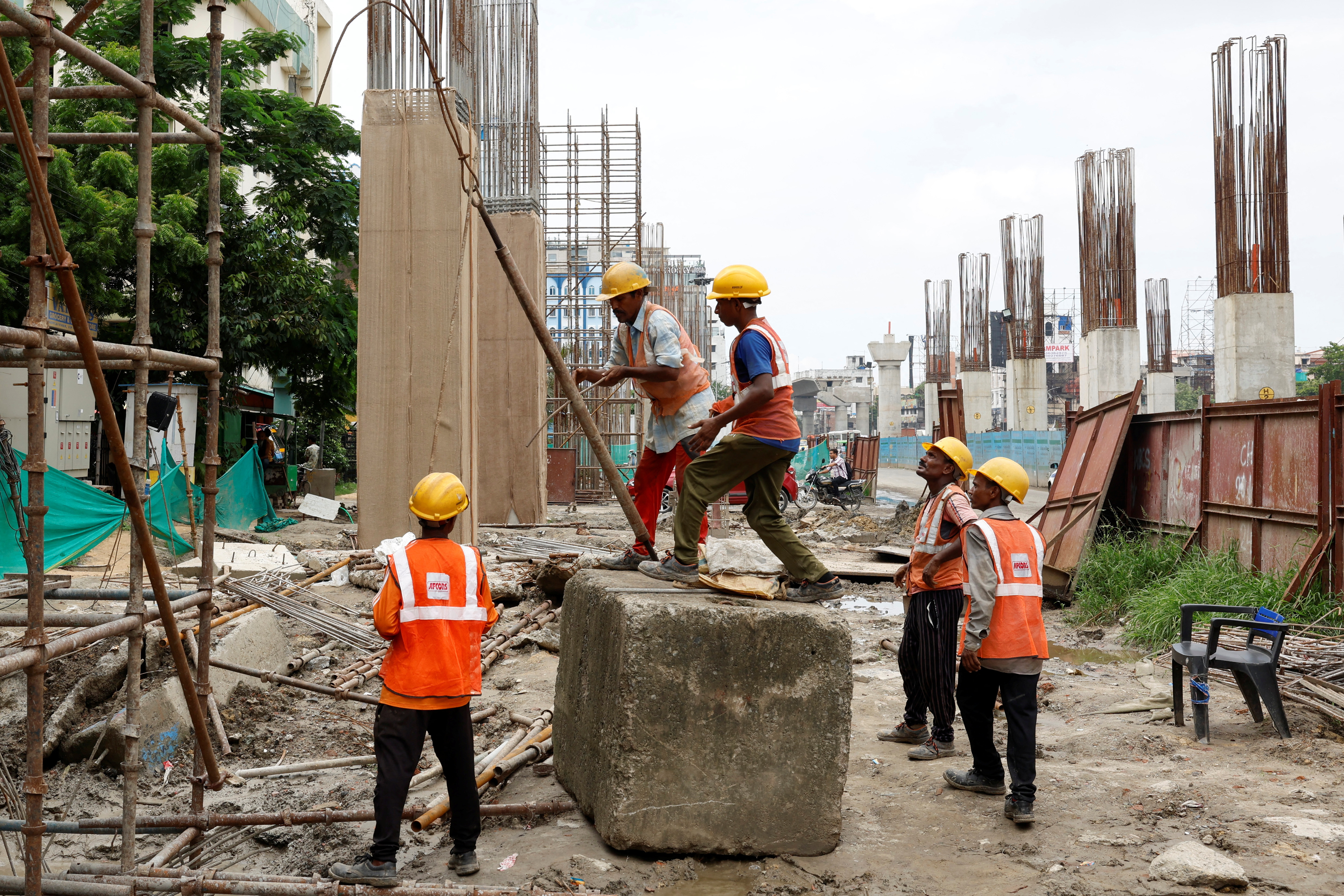 Indian workers on scaffolding